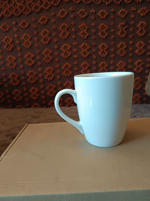 Biały Kubek z uchem - dzielnica Śródmieście Warszawa