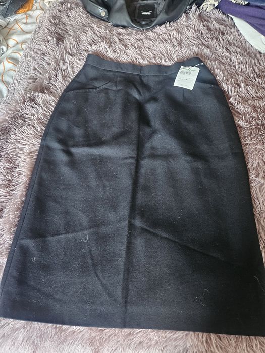 Saias pretas El Corte Inglês e Invicar