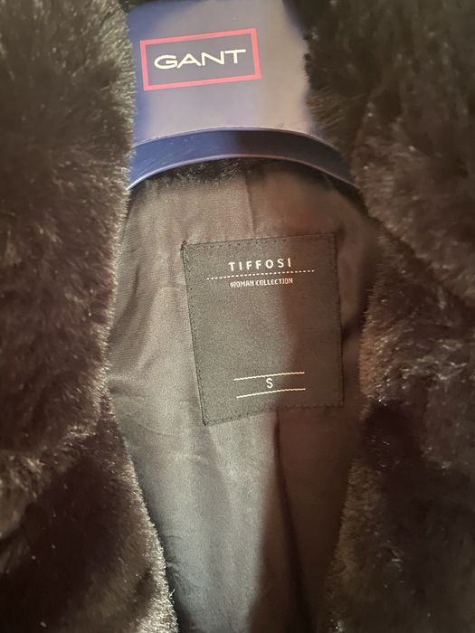 Casaco de pêlo preto