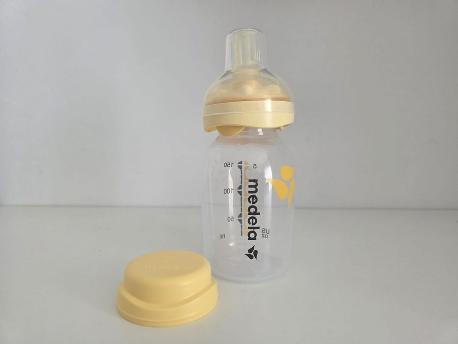 Biberão + coletor de leite + protetor de mamilos 
10€
