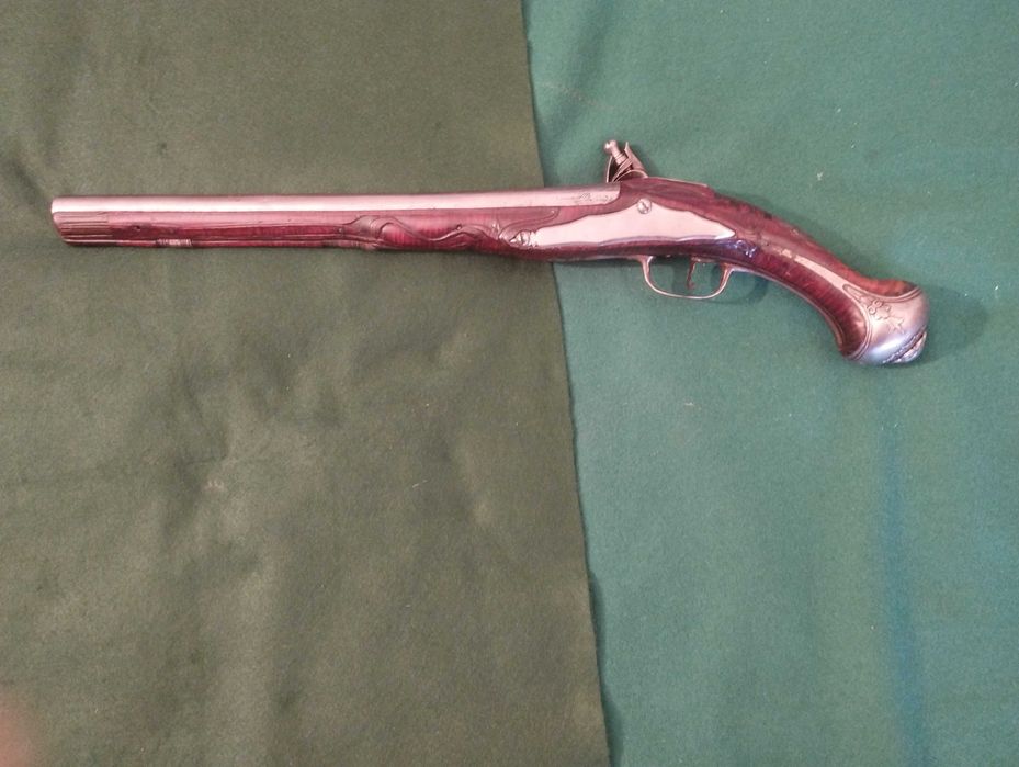 Pistola italiana de pederneira, datada de aproximadamente 1720/1750