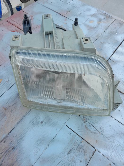 Farol renault clio