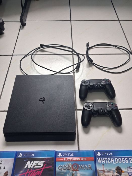 Ps4 slim + 2 comandos + pack de jogos(16)