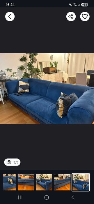 Sofa azul com pouco uso.