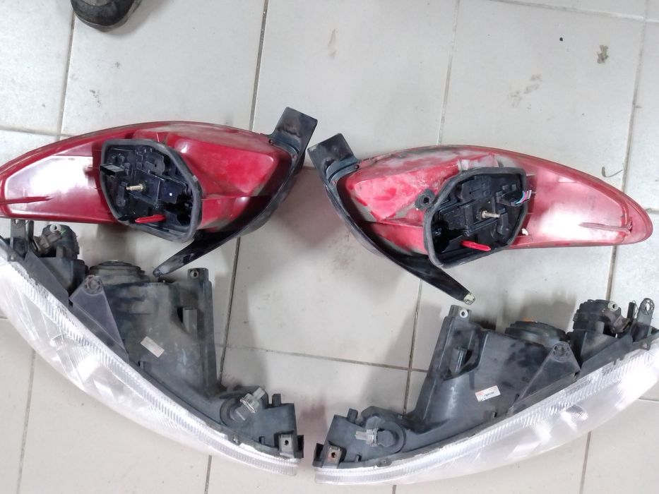 Передні фари  Peugeot 206