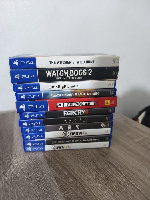 PlayStation 4 + 2 comandos + 11 jogos