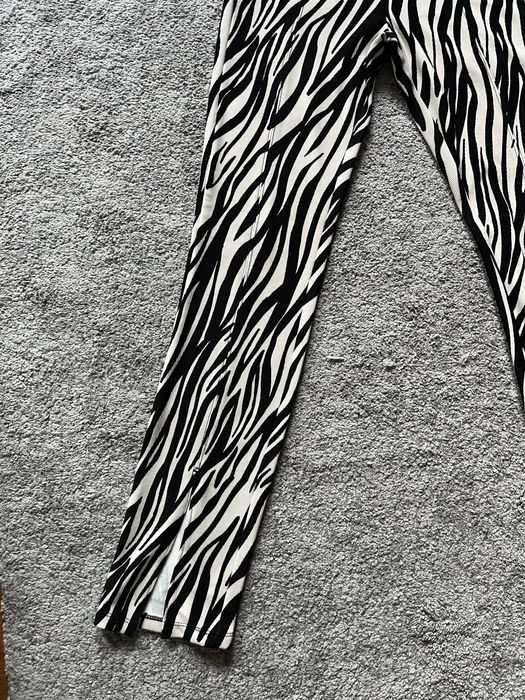 Calças elasticas 34