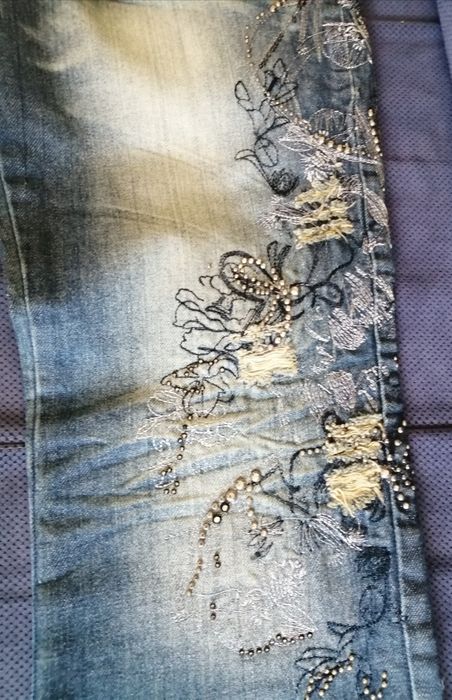 Nowe spodnie jeansy 40