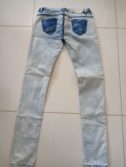 Spodnie jeansowe damskie, rozmiar 42, Cena  20 zl