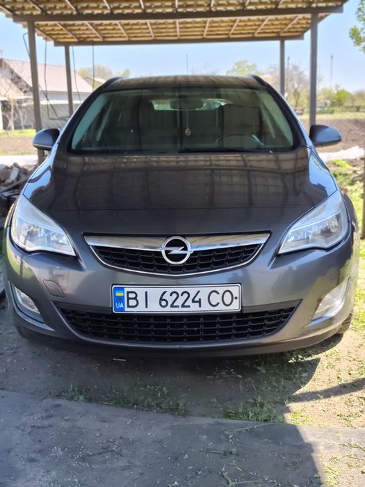 Опель Астра J sport tourer