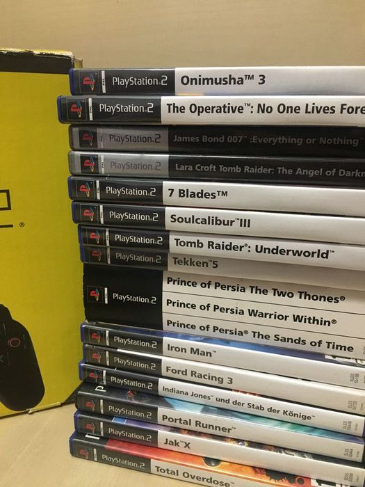 PlayStation 2 Slim + 2 Controllers + 17 Games64550980226305121