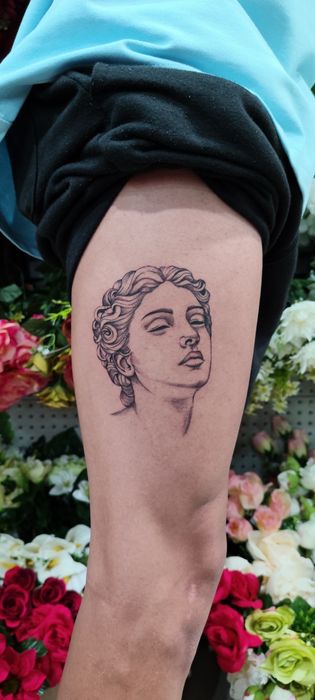 Troco uma tatuagem em um violão