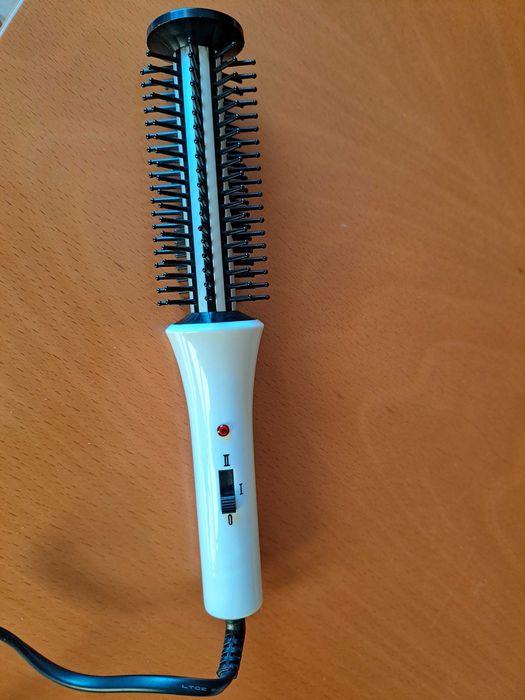 	Escova eléctrica de cabelo