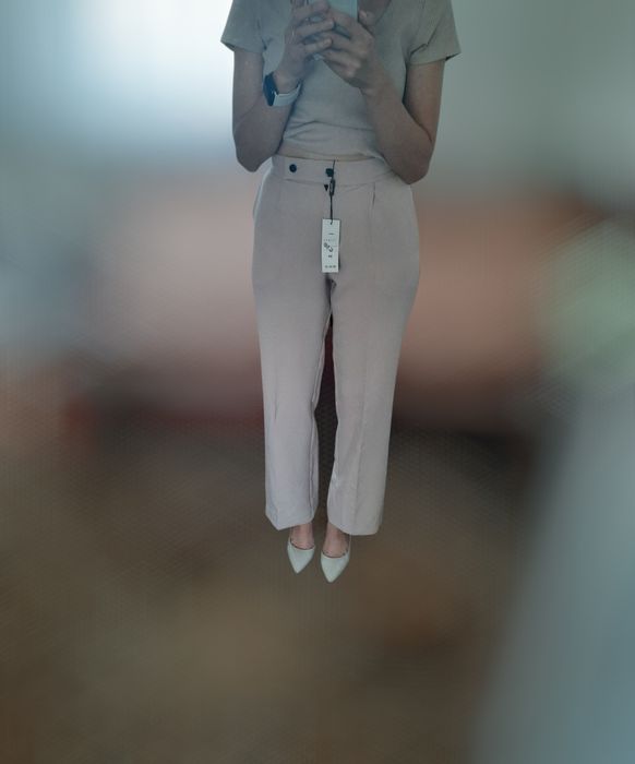 Нові брюки бежевого кольору