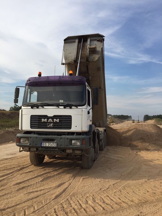 Transport + ładunek żwiru, piasku, ziemi, czarnoziemu, gruzu, kamienia