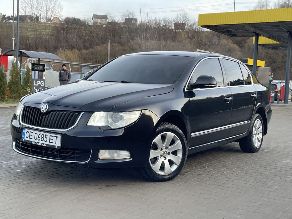 Суперб коробка автомат 2010 рік