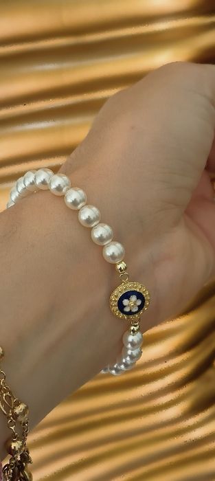 Pulseira pérolas com caramujo em prata