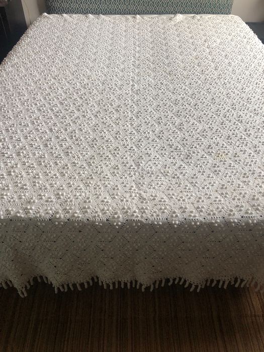Colcha de renda feita à mão