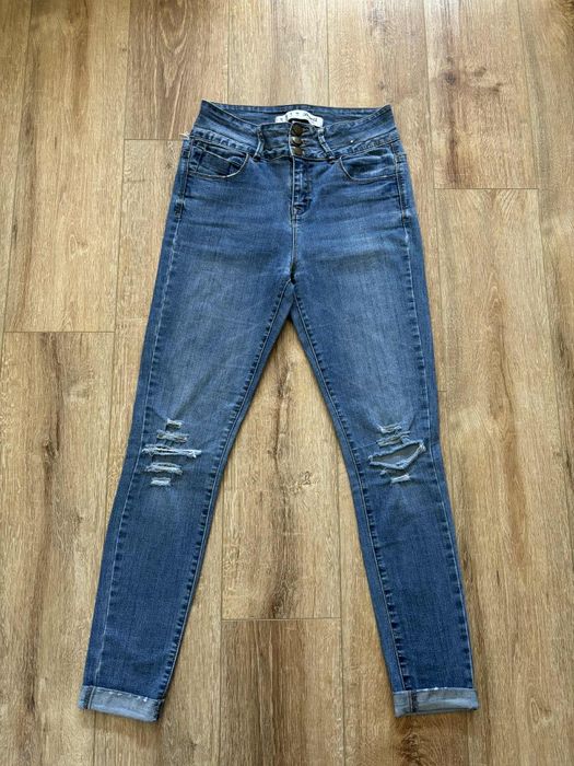Niebieskie jeansy skinny damskie spodnie rurki z przetarciami denim L