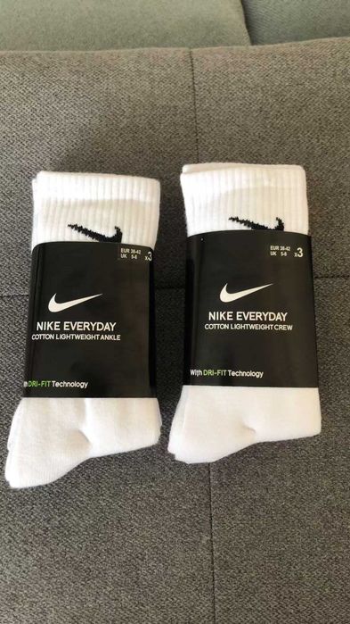 6 par skarpet Nike z czystego bawełny. Białe, długie, Rozmiar M / L