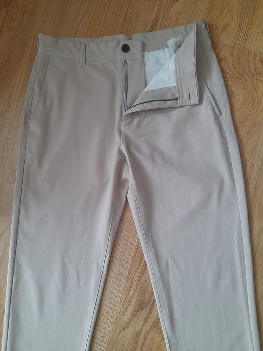 Beżowe męskie  spodnie Zara 38