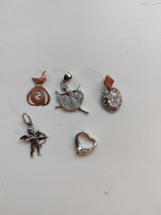 Дев'ять кулонів різних срібло 925 проба