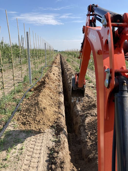 Minikoparka wynajem usługi minikoparką  wiertnica przyłącza