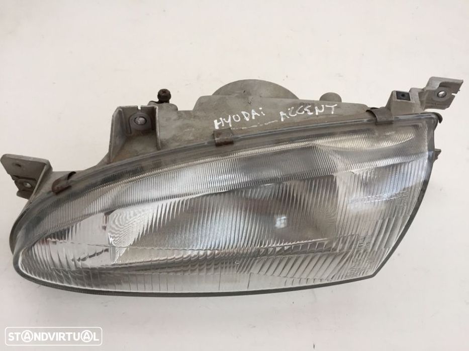 farol óptica esquerdo Hyundai accent