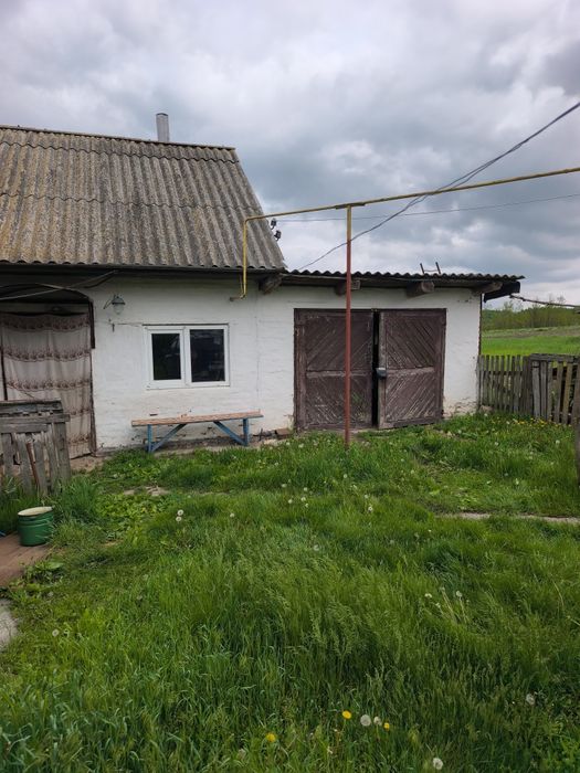 Продам приватизовоний будинок з приватизованою землею 45 соток.
