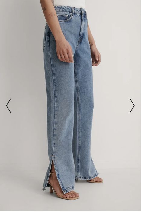 Джинсы клеш с разрезами внизу NA-KD р. 36, высокая посадка