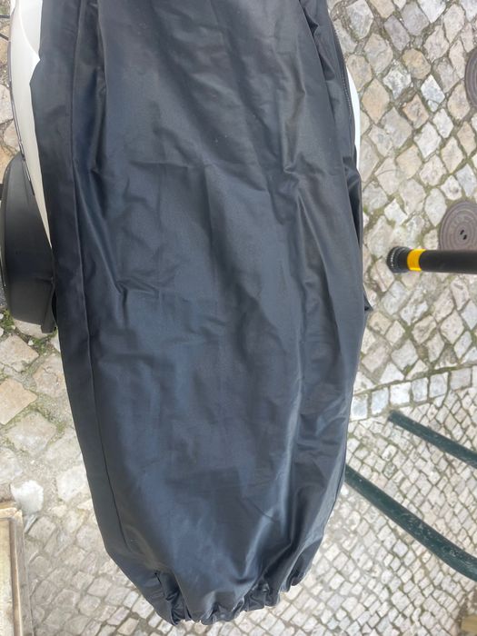 Capa de chuva e Galochas