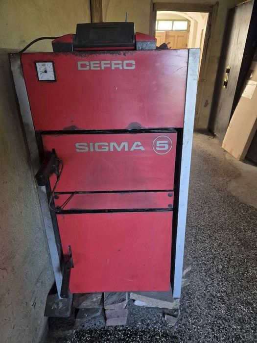 Kocioł na ekogroszek  Defro Sigma E 12 kW z zasobnikiem