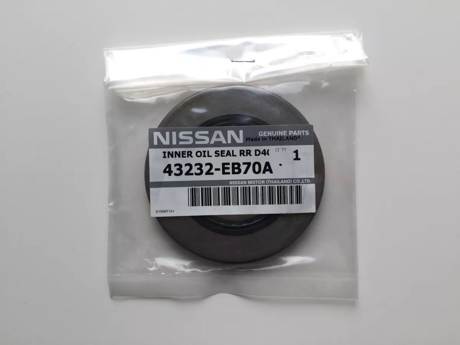 Сальник ступицы NISSAN NAVARA 43232EB70A оригiнал