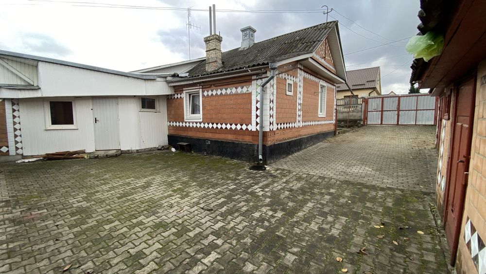 Продам 2 суміжні земельні ділянки з житловими будівлями