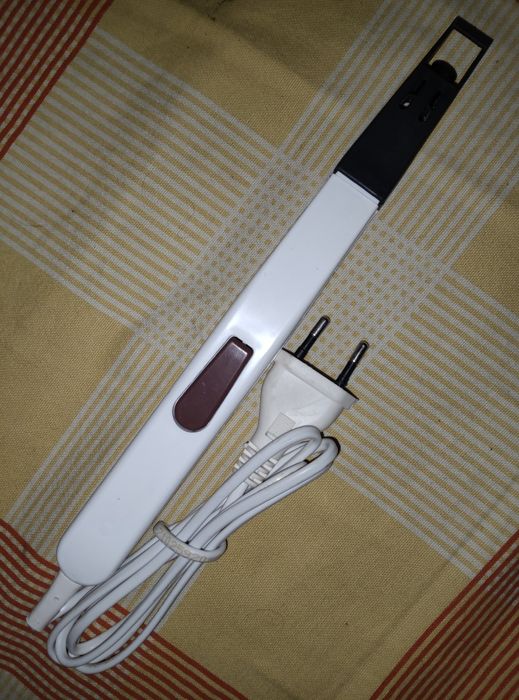 Зажигалка электрическая для газовой плиты.