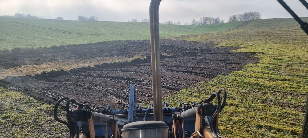 Prace ziemne koparkoładowarką*Koparka*widły