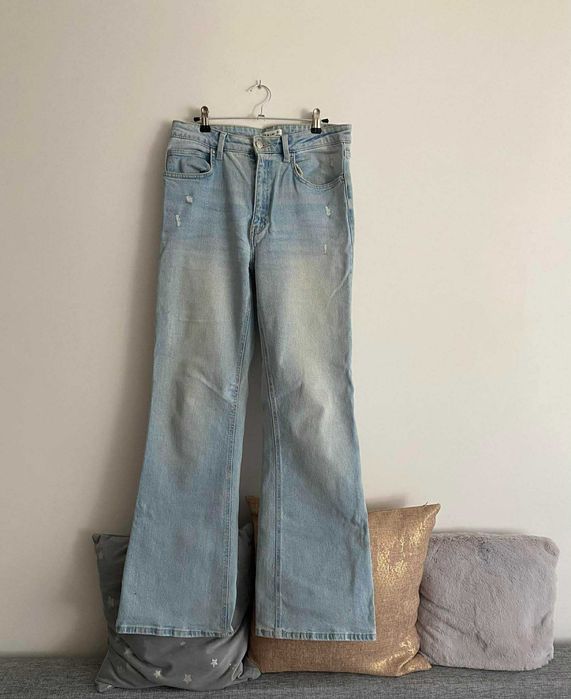 Spodnie jeansowe poszerzane damskie rozm. L/40