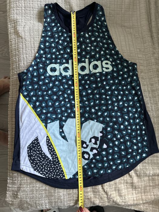 Продам фирмееная майка адидас привезена из за границы цвет синий матер