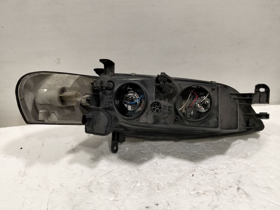 Farol Opel Vectra B ÓTICA esquerdo 1998