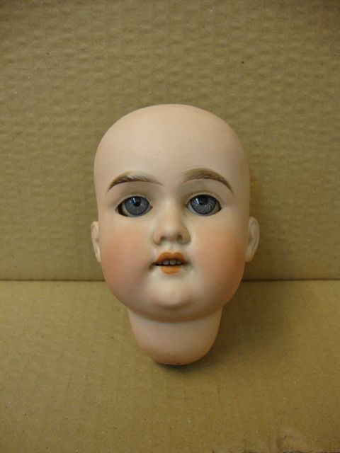 Cabeça de boneca antiga, em Biscuit