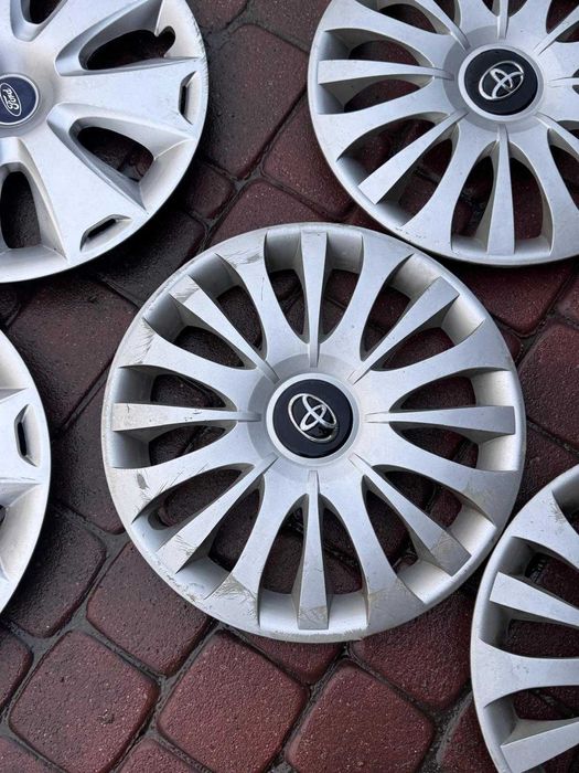 '15 Kołpaki komplet oryginalne Toyota Yaris Auris Aygo Avensis Proace