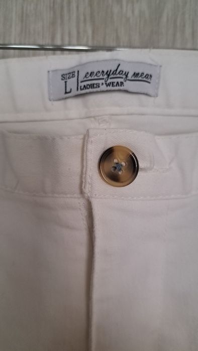 Biale spodnie materiałowe jeansy L 7/8 do kostki