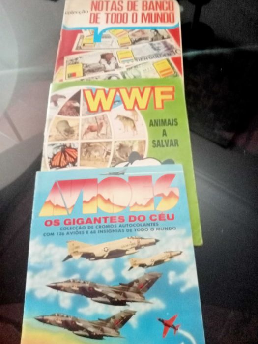 Três cadernetas de cromos