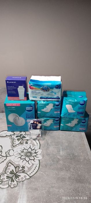 Podkłady, podpaski, wkładki laktacyjne, woreczki do pokarmu, smoczek