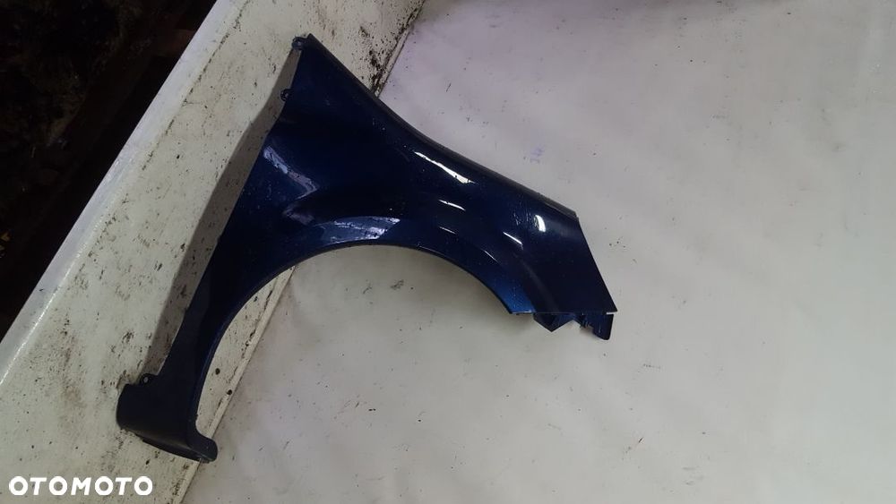 * RENAULT MODUS BŁOTNIK PRZEDNI PRAWY TED44 - 2
