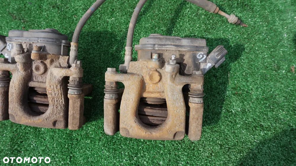 Mazda 6 GJ jarzmo zacisk hamulcowy elektryczny tyl tylny lewy prawy 2015- - 3