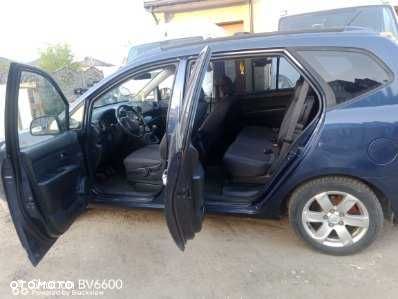 Kia Carens - 4