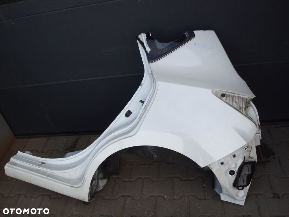 NISSAN PULSAR 14-18 BŁOTNIK LEWY TYLNY - 1