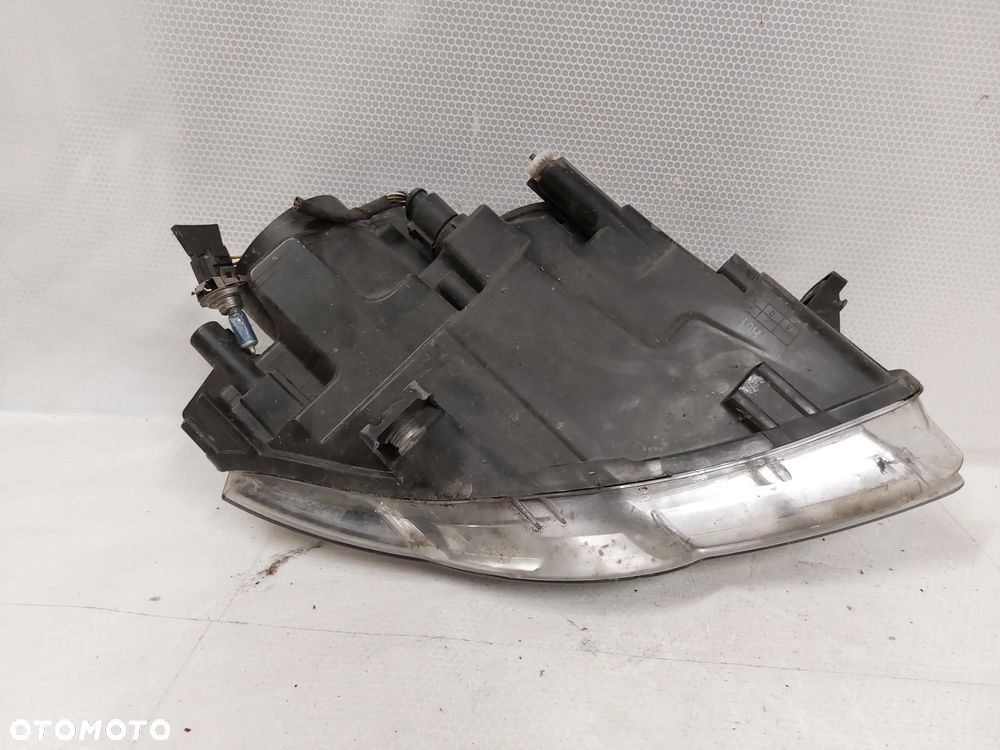 .  LAMPA PRZOD PRZEDNIA LEWA VOLKSWAGEN PASSAT B6 - 5
