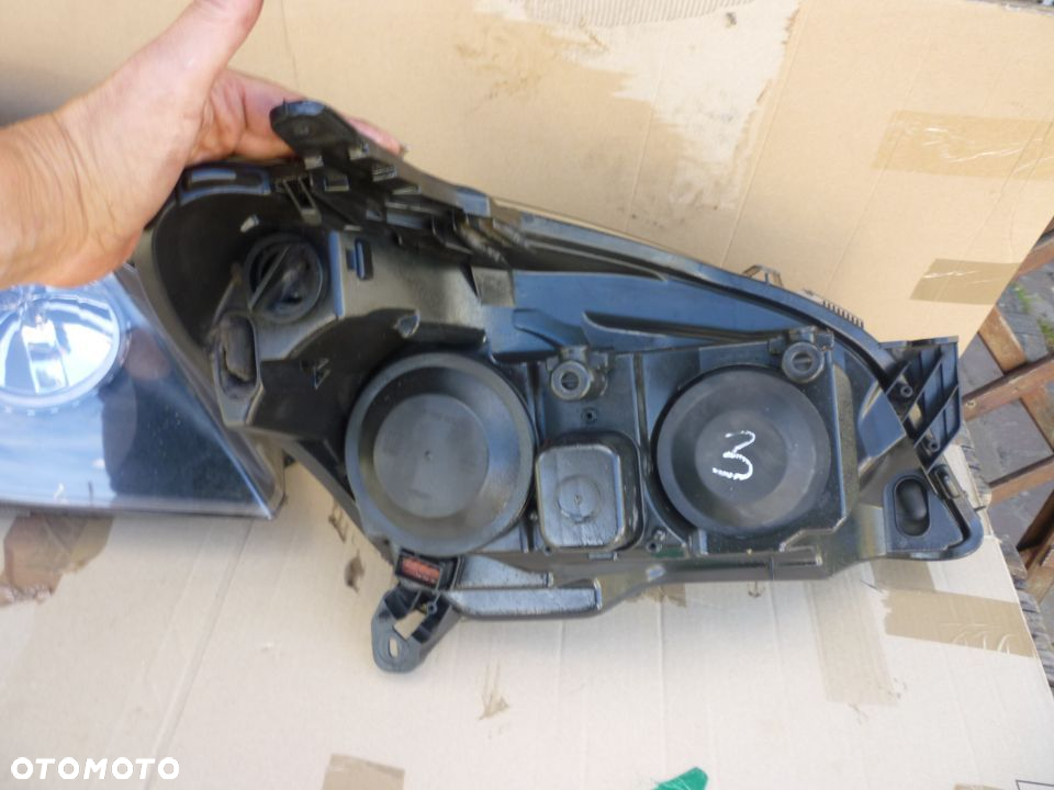 Lampa  lewa OPEL ASTRA H HELLA EUROPA - 5